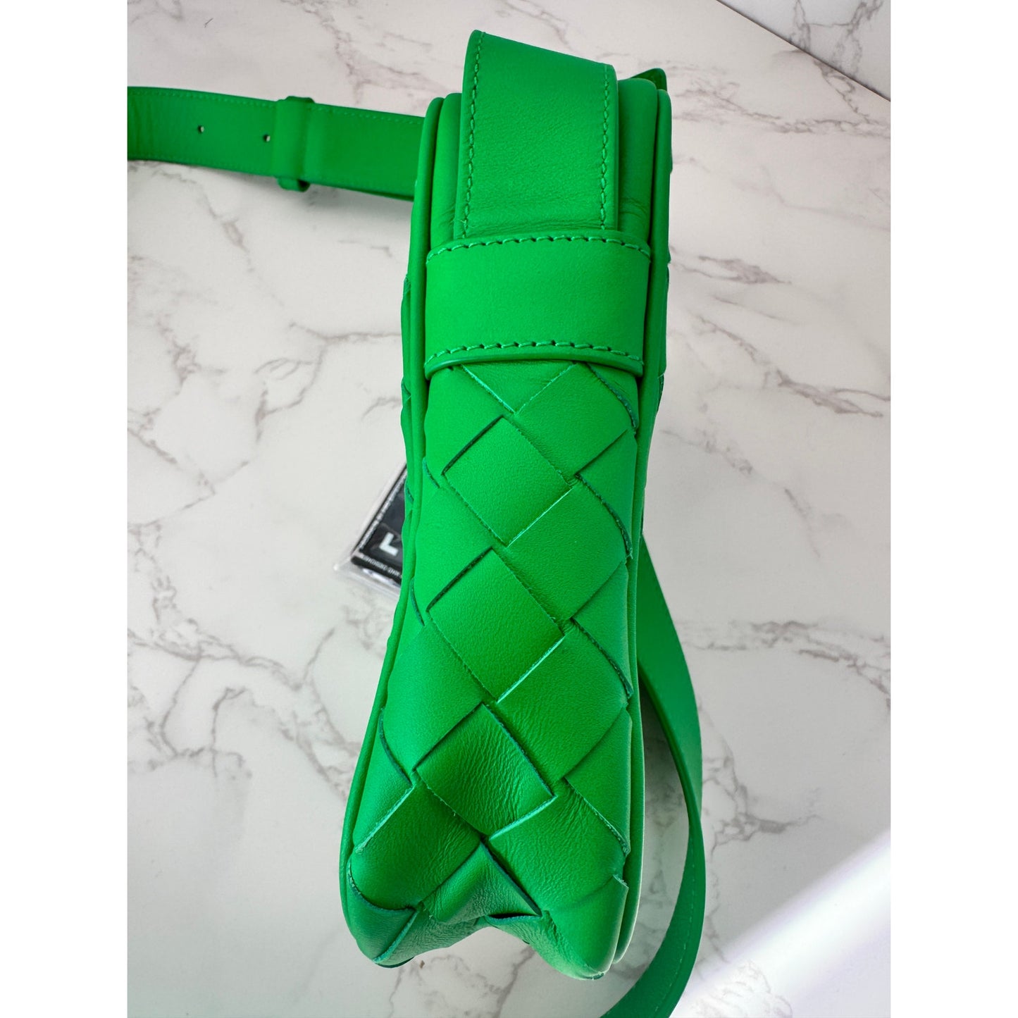 Bottega Veneta Intrecciato woven leather phone pouch in parakeet green!