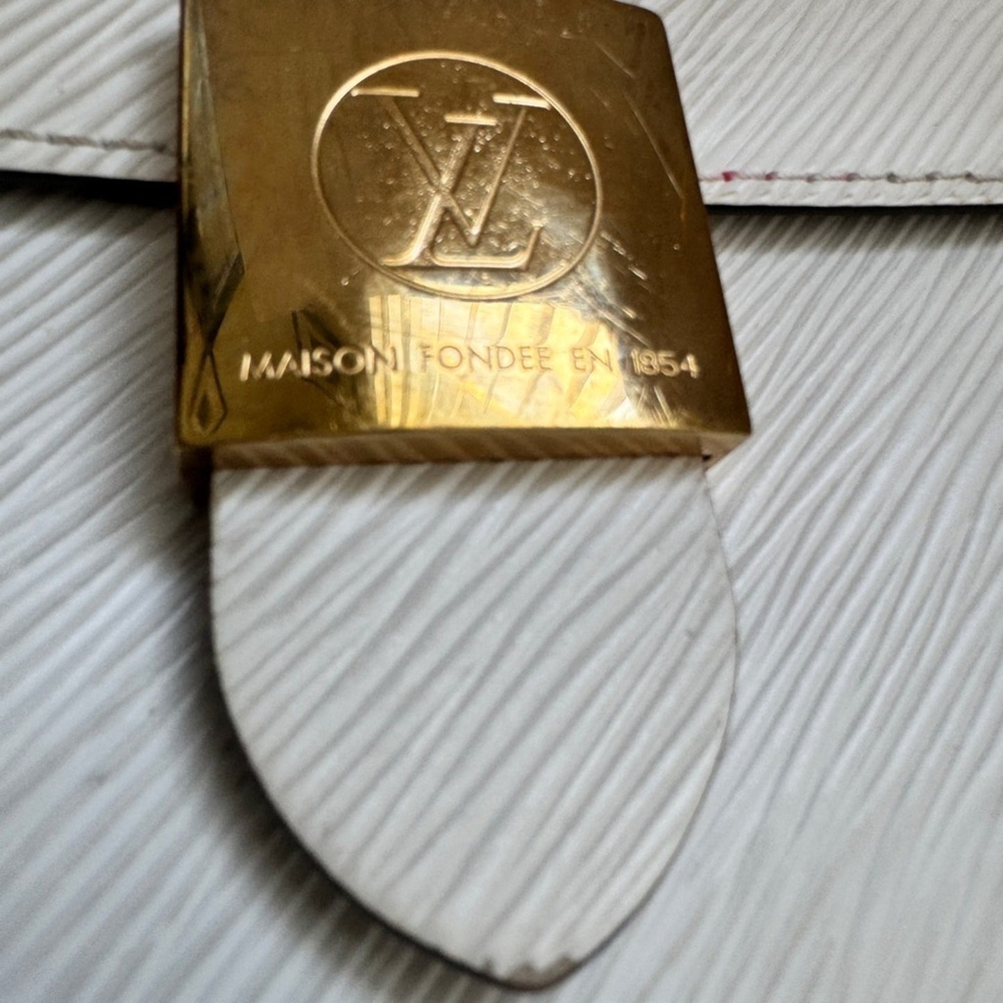 Authentic Louis Vuitton Locky BB in Blanc Epi Leather