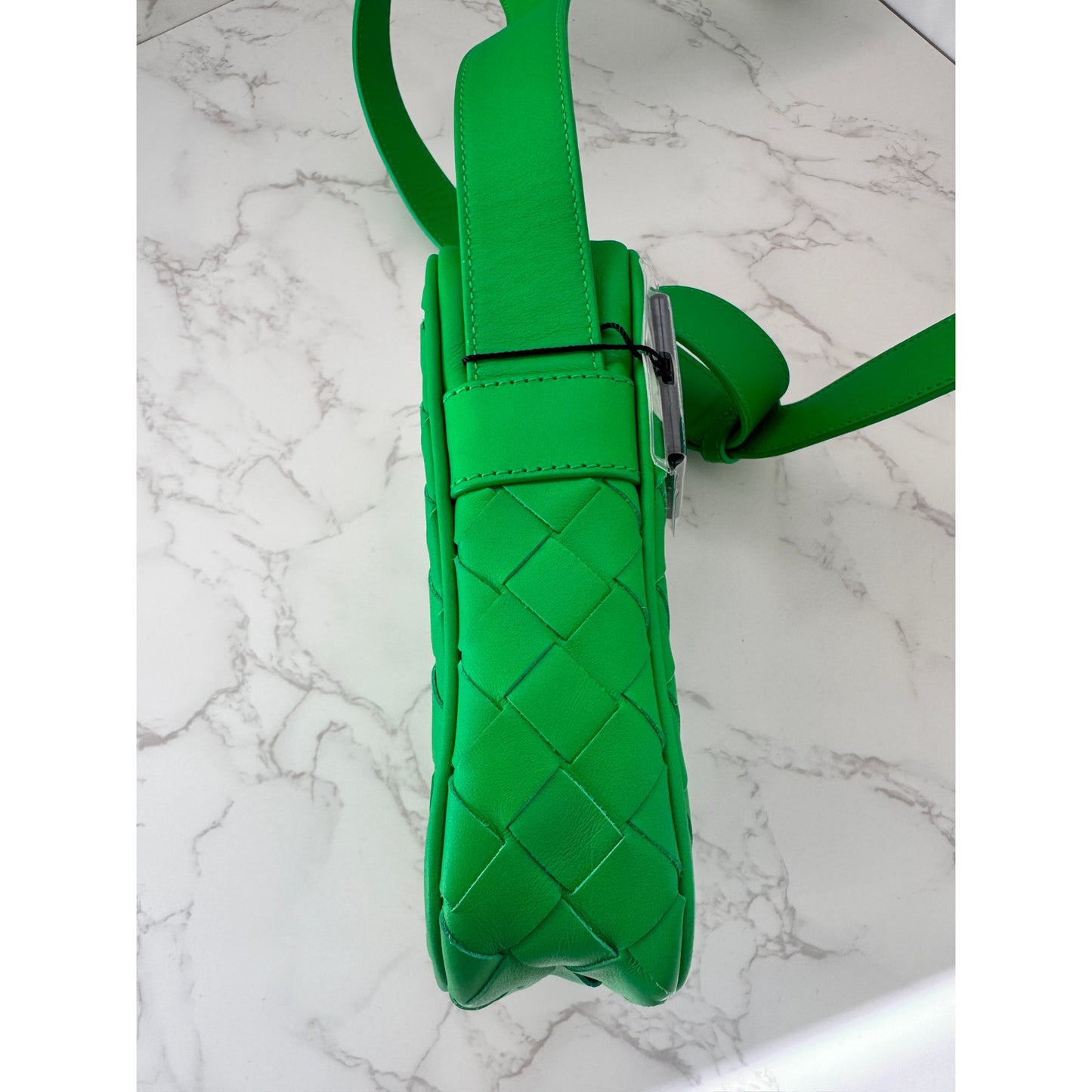 Bottega Veneta Intrecciato woven leather phone pouch in parakeet green!