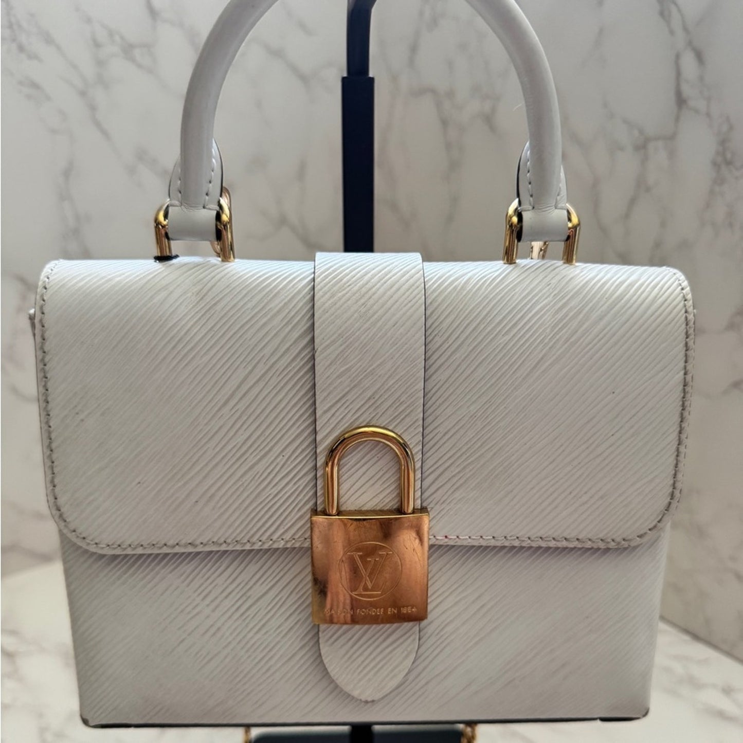 Authentic Louis Vuitton Locky BB in Blanc Epi Leather