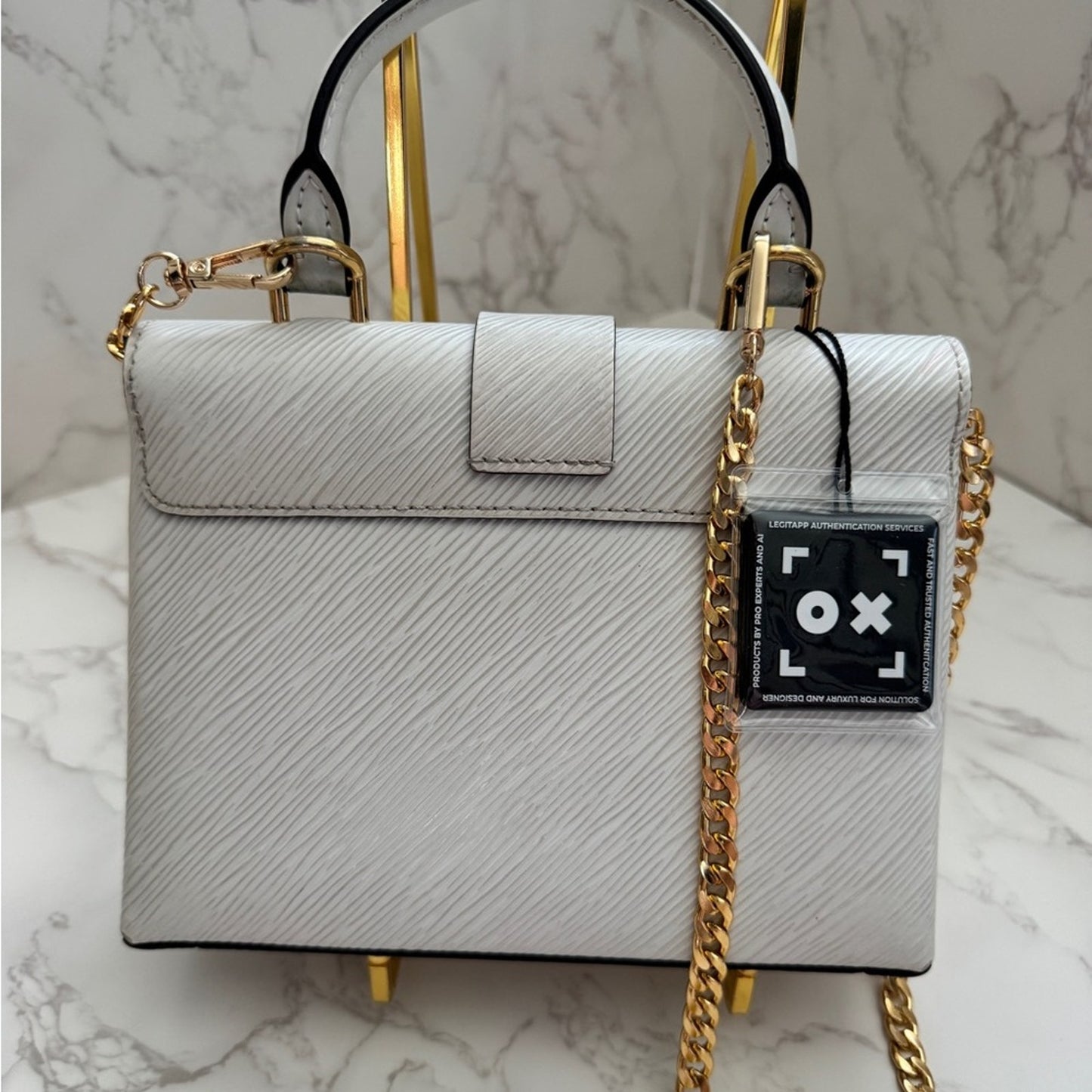 Authentic Louis Vuitton Locky BB in Blanc Epi Leather