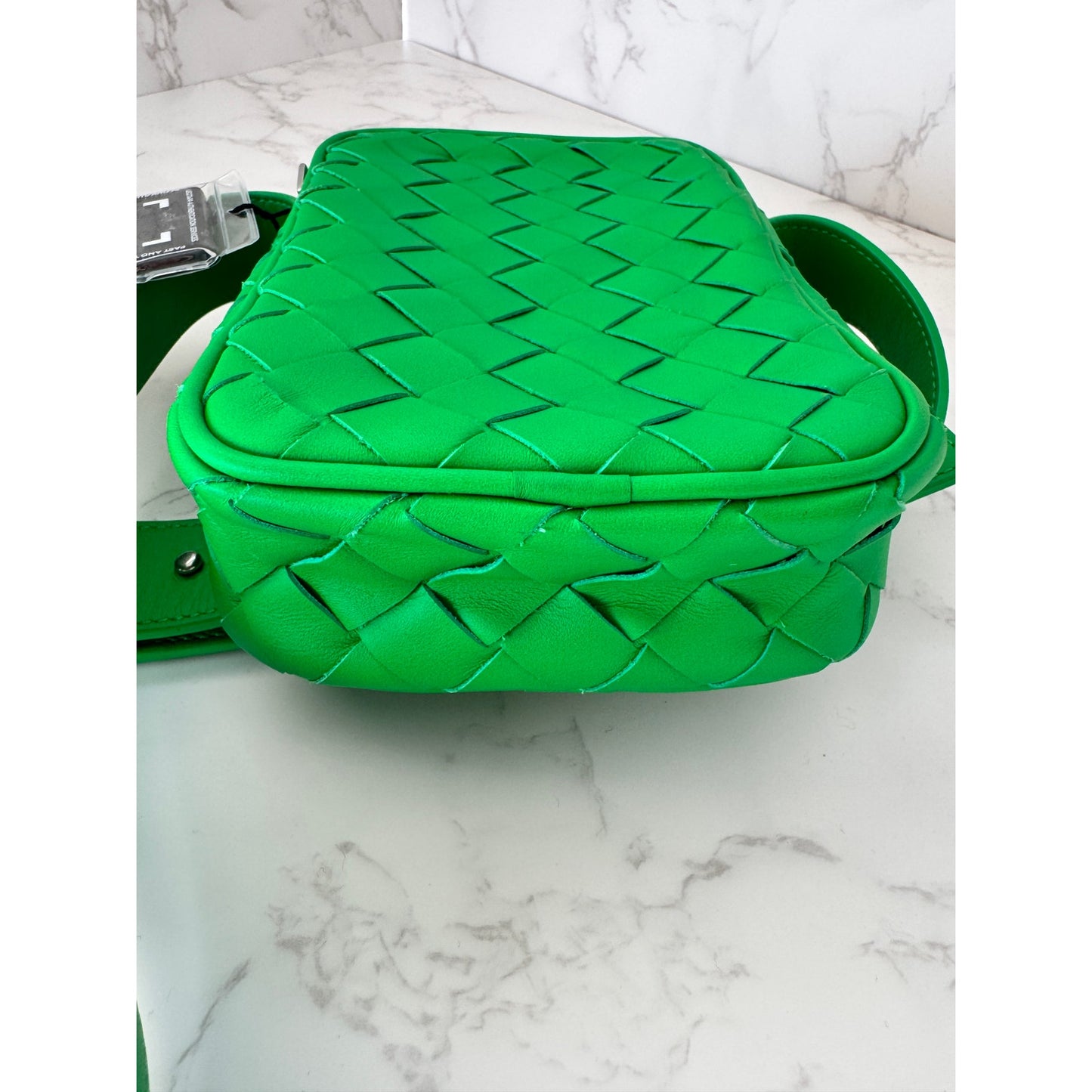 Bottega Veneta Intrecciato woven leather phone pouch in parakeet green!