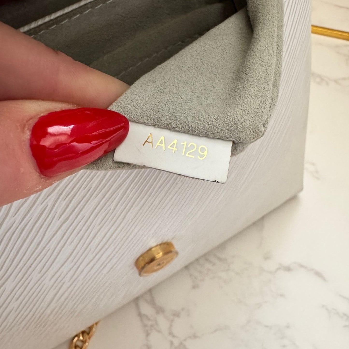 Authentic Louis Vuitton Locky BB in Blanc Epi Leather