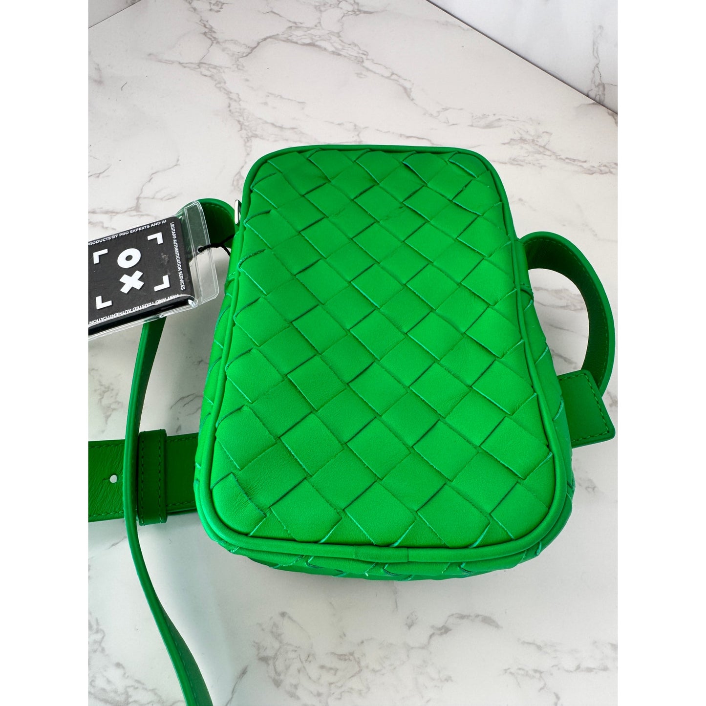 Bottega Veneta Intrecciato woven leather phone pouch in parakeet green!