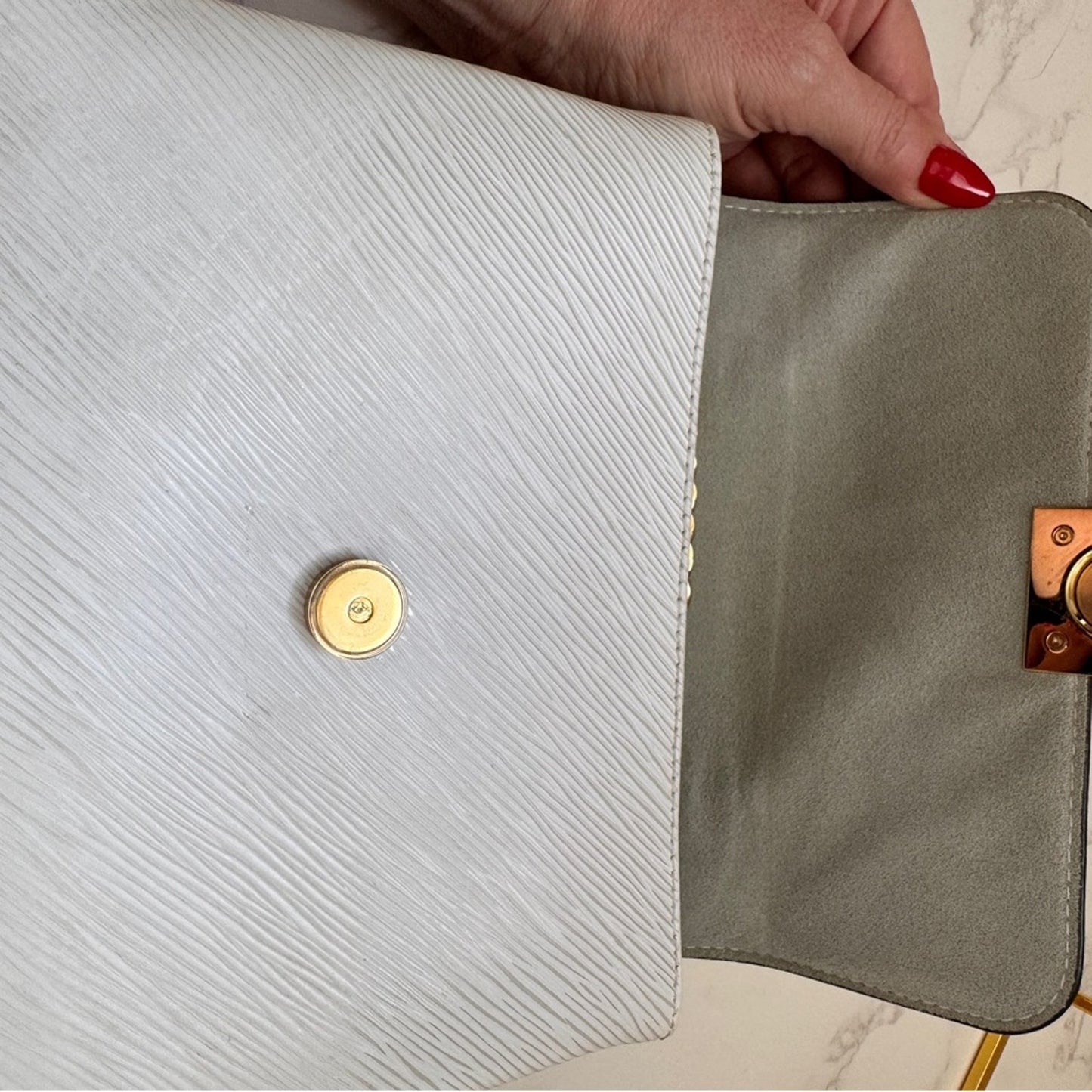 Authentic Louis Vuitton Locky BB in Blanc Epi Leather