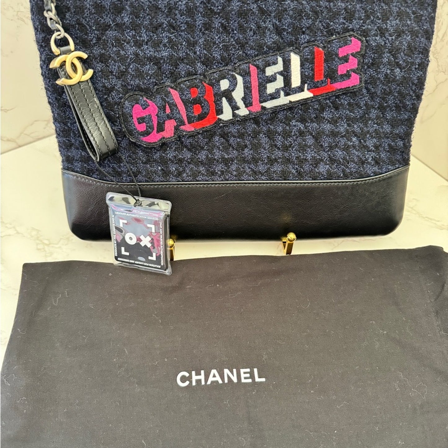 Chanel Gabrielle clutch in quilted tweed and calfskin leather